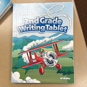 A set of 2 Abeka 2nd Grade Workbook Writing Tablets